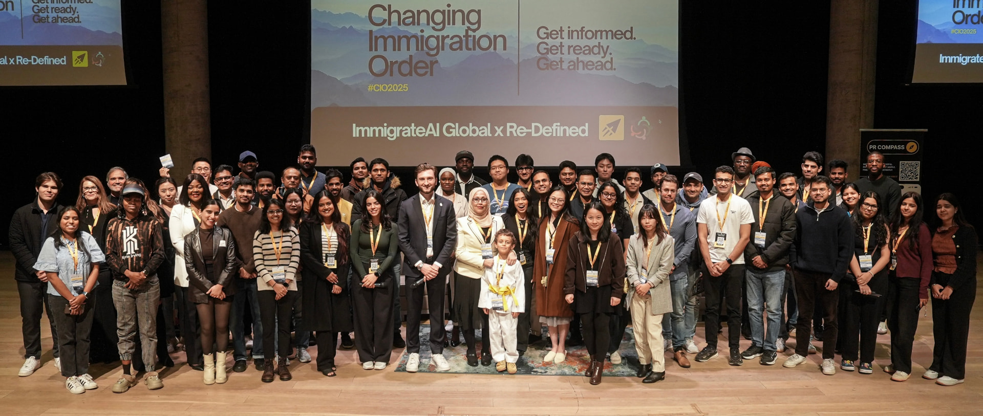 Attendees of the 2025 Changing Immigration Order conference on stage in Halifax